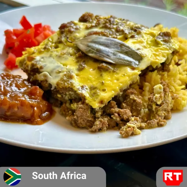 South African Bobotie with Geelrijs, Chutney and a Side Salad (includes complimentary surprise dessert)