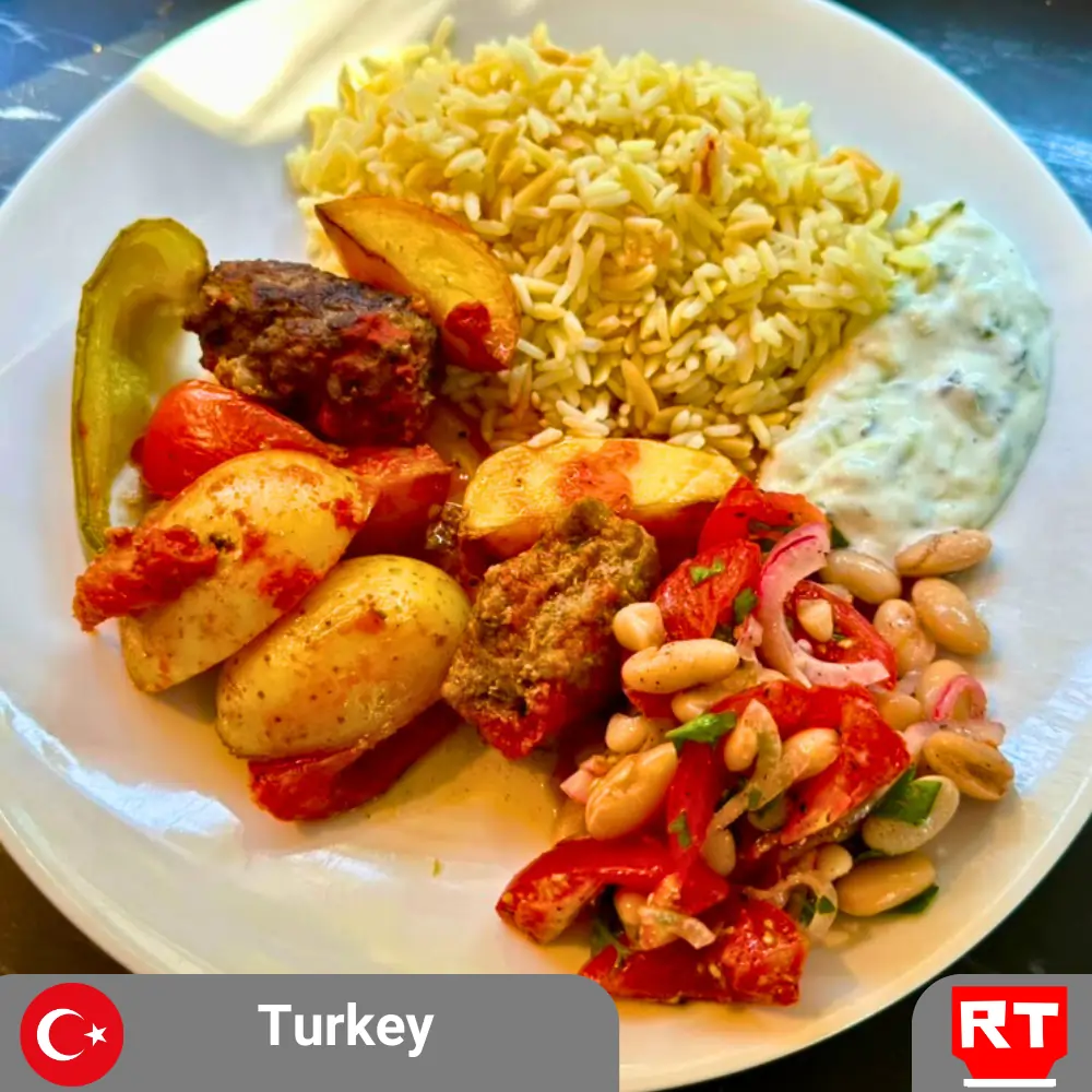 Beef Köfte with Potatoes and Green Peppers, Orzo Pilaf, Bean Salad, and Cacık (includes complimentary surprise dessert)