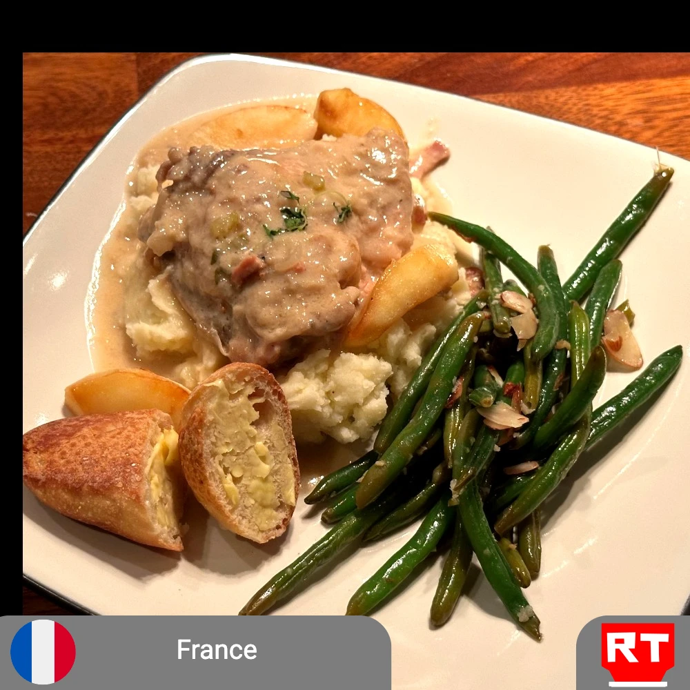 Poulet à la Normande: Normandy’s Creamy Apple-Braised Chicken with Green Beans, Mashed Potatoes and French Bread (includes complimentary surprise dessert)