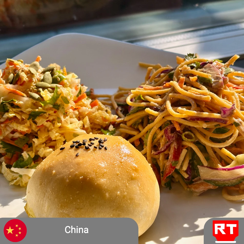 A Curried Bun, Sesame Noodles & Napa Salad: A Meal Rooted in Memory - Vegetarian Option Available (includes complimentary surprise dessert)