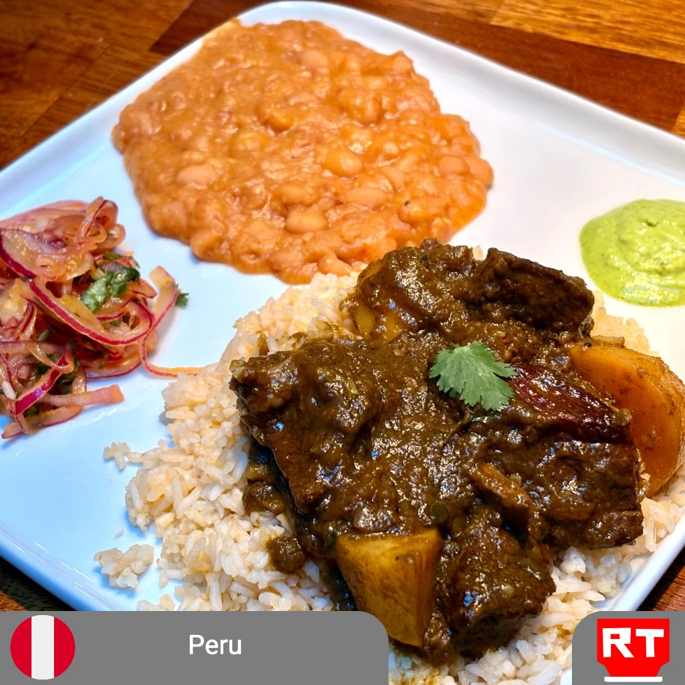 Peruvian Seco de Carne with Creamy Beans, Rice & Fresh Salsa Criolla (includes complimentary surprise dessert)