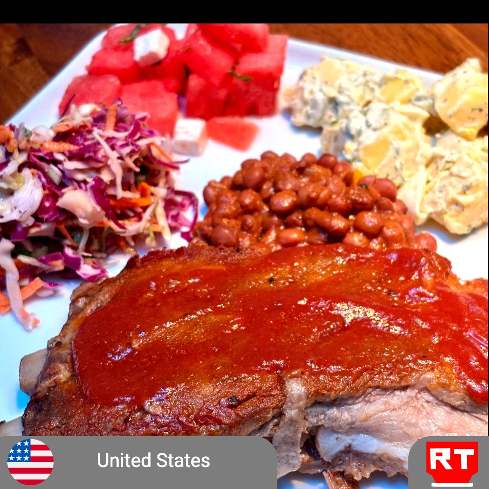 Slow-Cooked Pork Ribs • Creamy Cabbage Slaw • Herbed Potato Salad • Watermelon, Mint & Feta Salad
